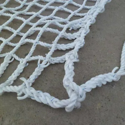 Climbing net made of Ø 16 mm PP spun fibre rope, # 300 mm mesh size, knots  spliced by hand
